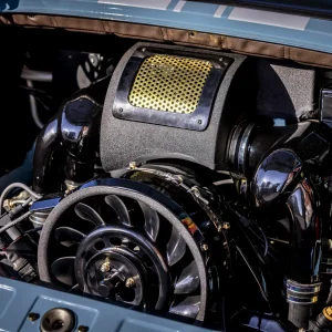 Close-up of a car engine compartment.